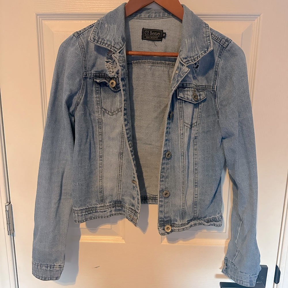 Distressed denim jacket